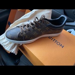Brand New Louis Vuttion Sneakers never been worn.